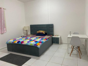 Sharjah Homestay not hotel Master Bedroom with attached private washroom in furnished 2 BHK flat